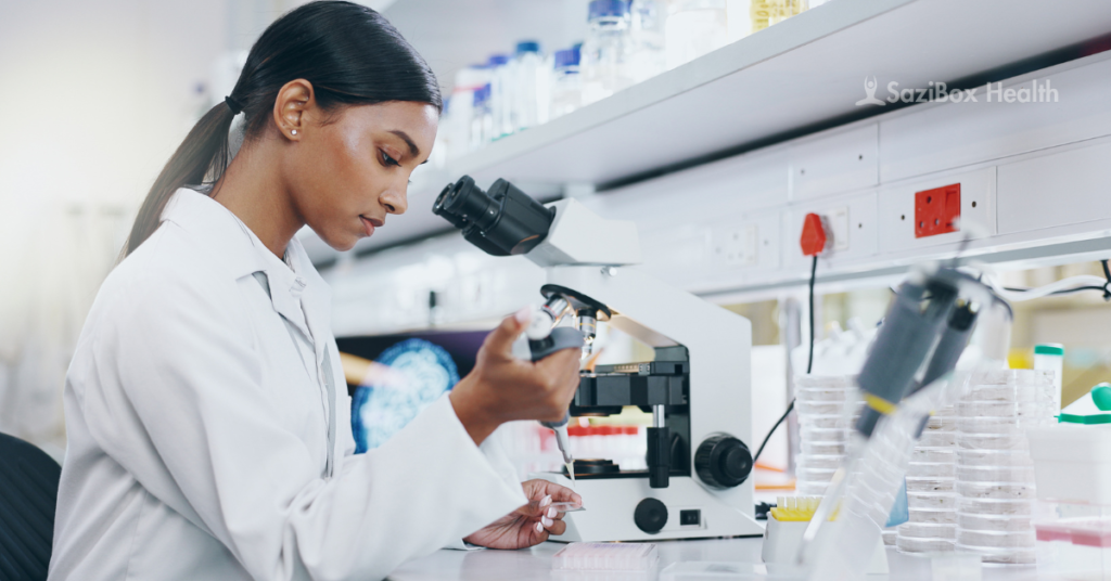 A medical professional examining samples under a microscope in a laboratory, symbolizing efforts to combat antibiotic resistance.