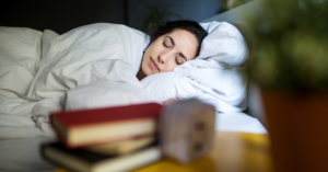 Person peacefully sleeping, illustrating a relaxing bedtime routine for managing sleep apnea.