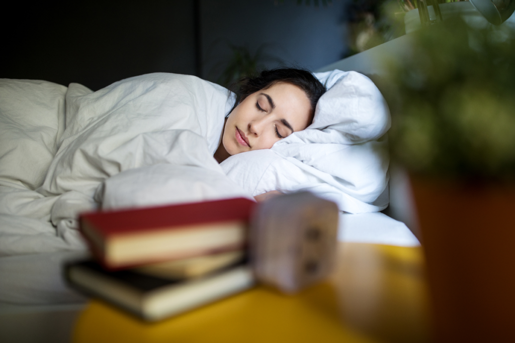 Person peacefully sleeping, illustrating a relaxing bedtime routine for managing sleep apnea.