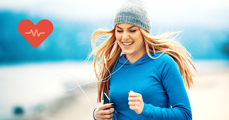 Young woman jogging outdoors to improve cardiovascular health.